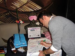 dana brunetti signing wizard jeans for charity.jpg
